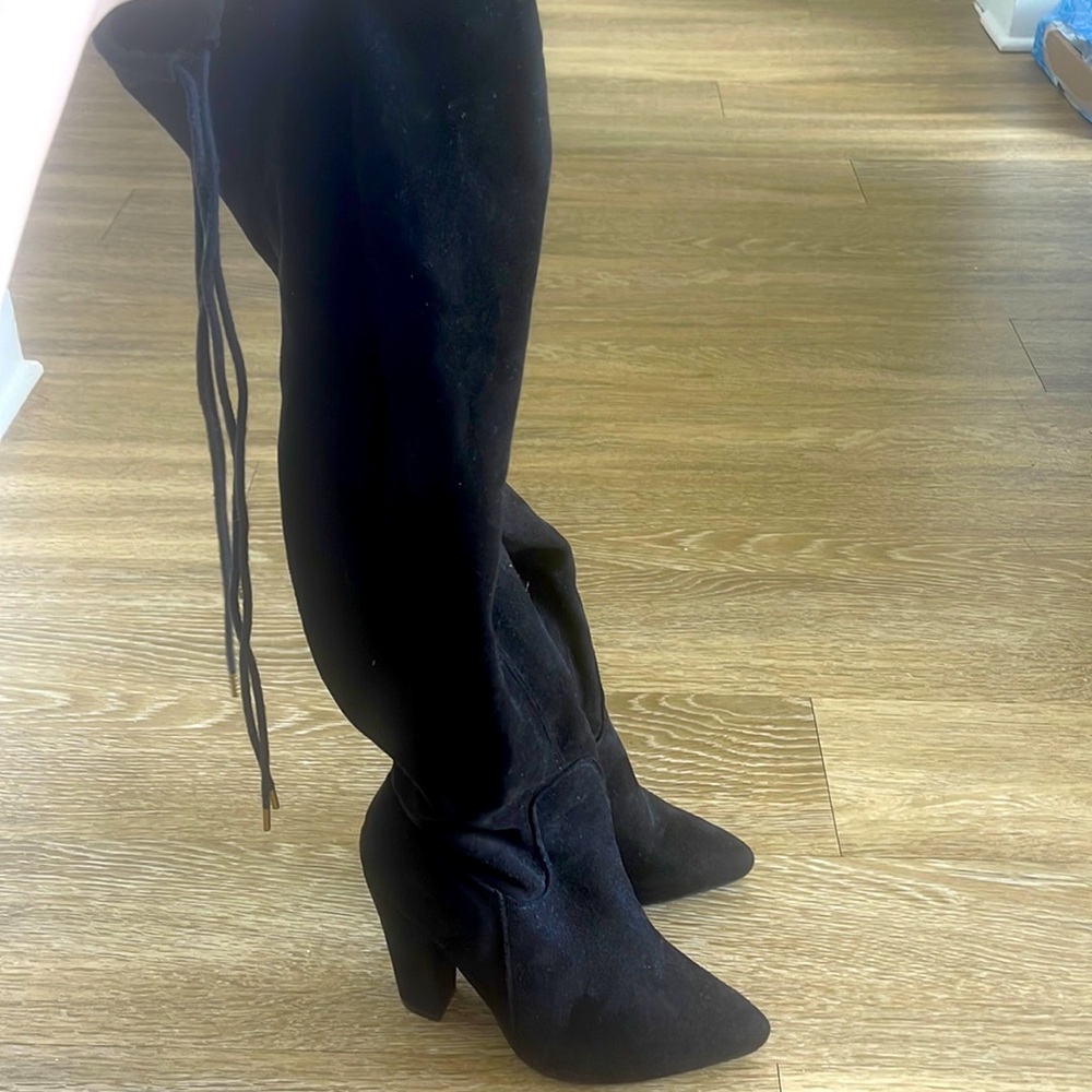 Selling Black sueded thigh high boots
